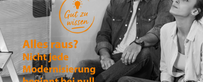 Modernisierung der Heizung. Ein Paar sitz erschöpft neben einer Heizung.